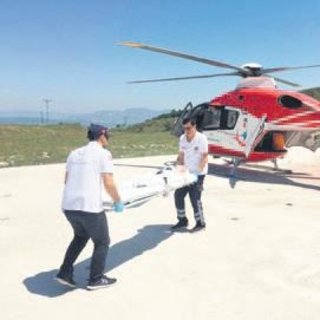 Yaralı çocuk için helikopter ambulans