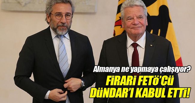 Gauck hakkında yakalama kararı olan firari FETÖ'cü Dündar'ı kabul etti!